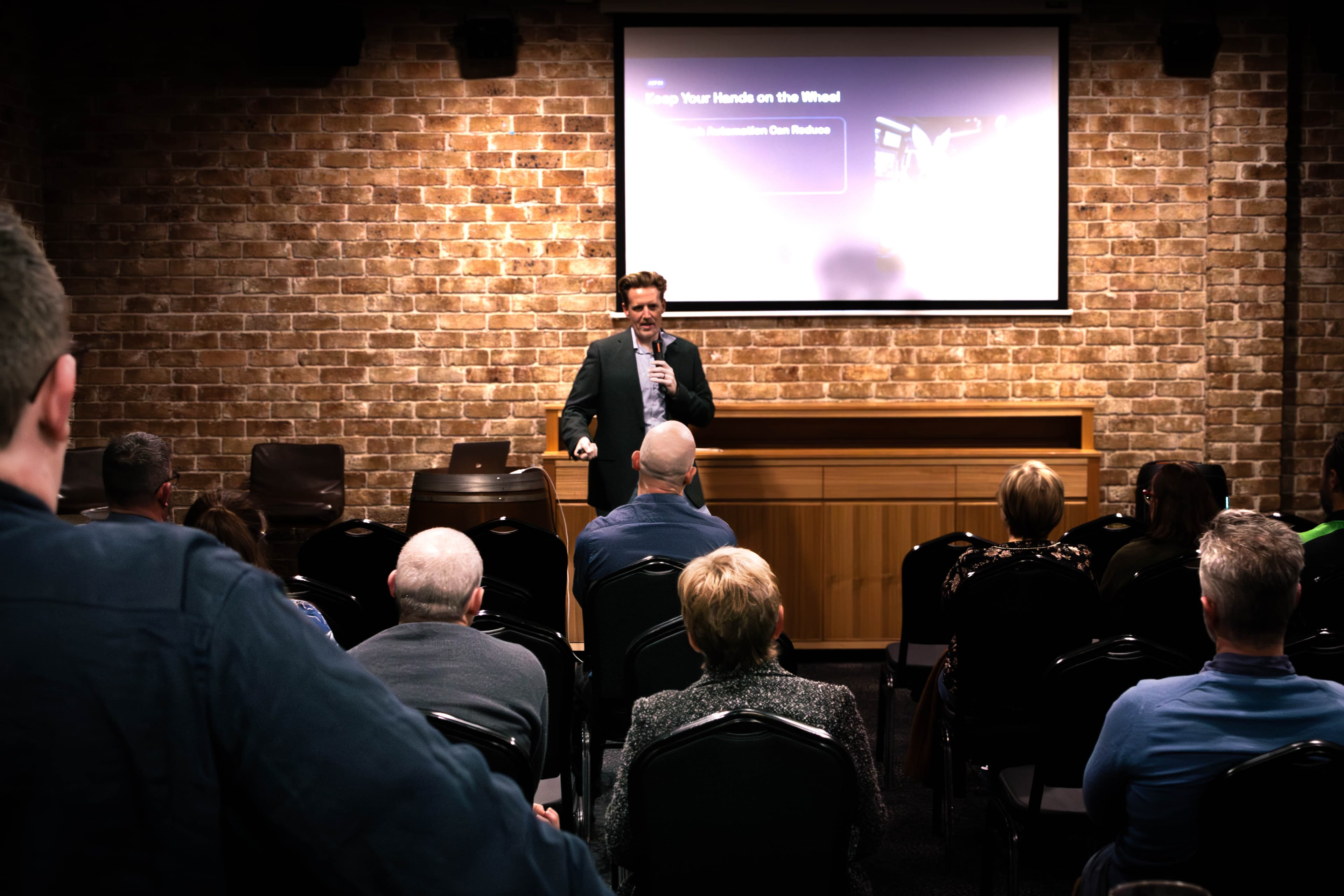 Audience at an AI Operators live session
